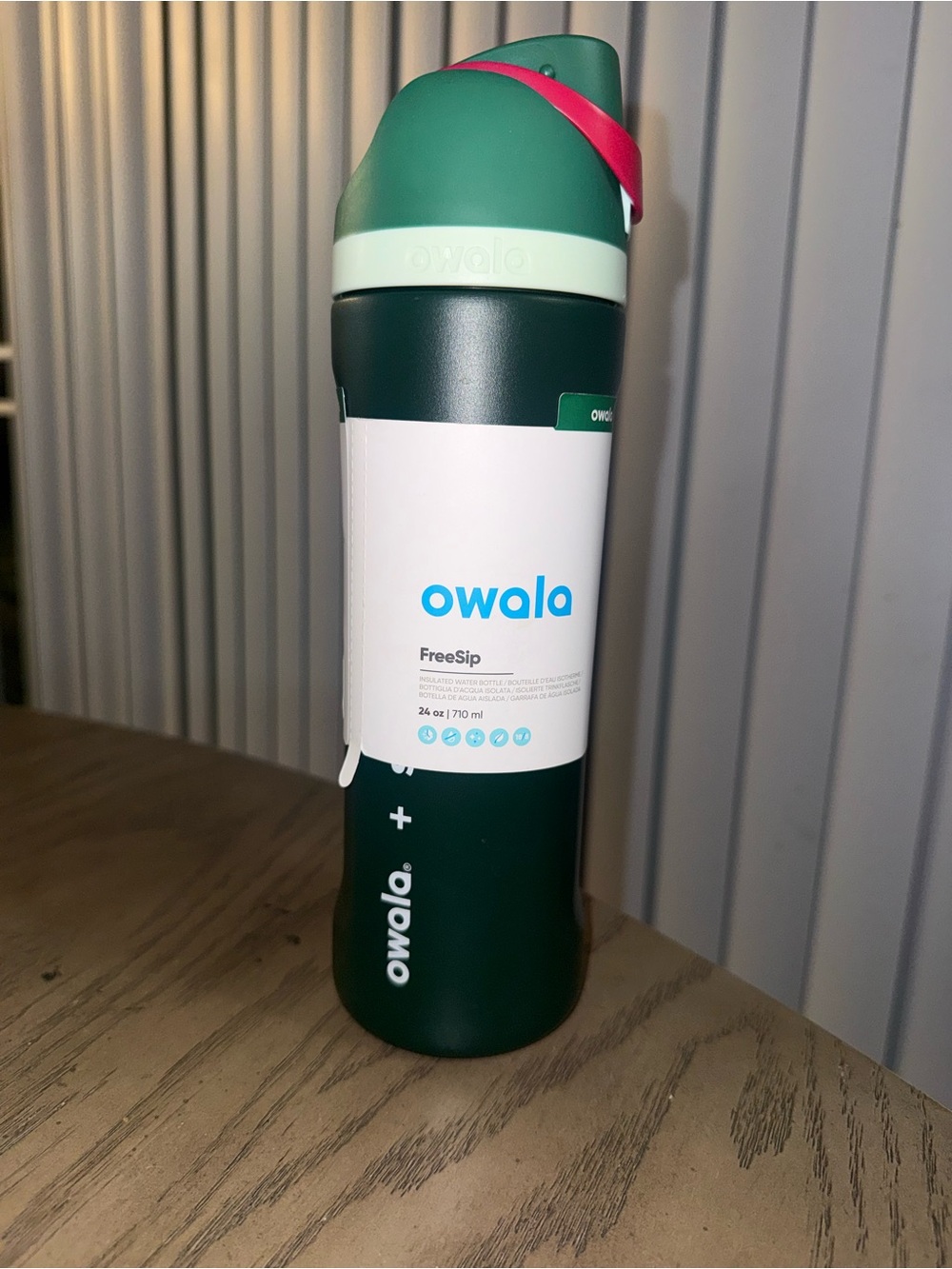 Owala FreeSip Water Bottle in Dark Green with Mint & Pink Accents
